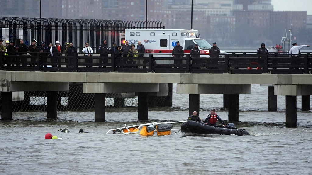 Detail spotted in footage of NYC helicopter crash shows how helicopter broke in two and plunged into river