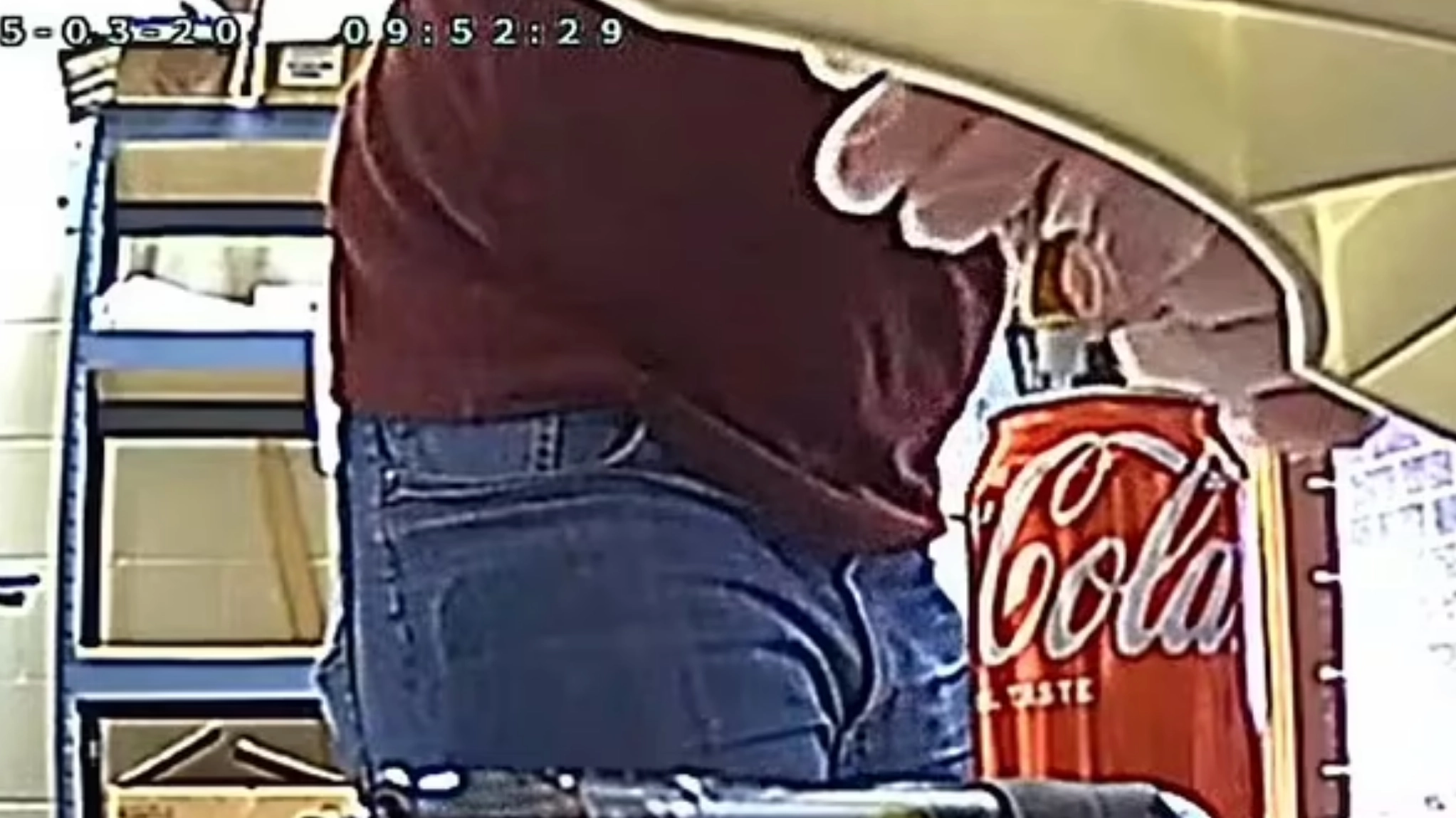 Woman caught coworker's horrifying act on camera she set up after noticing concerning smell from her Coke cans
