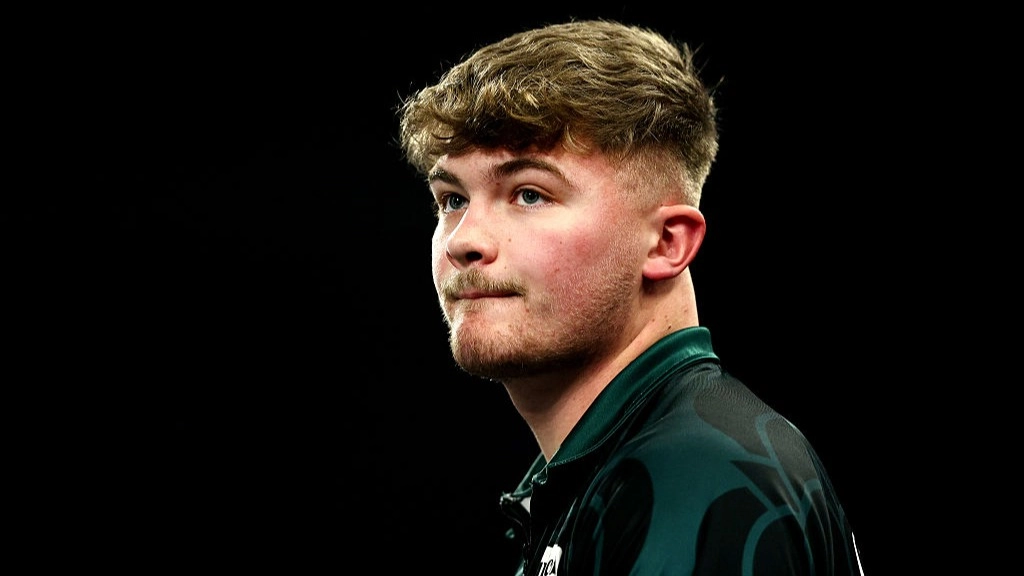 Bricklayer, 20, causes huge shock at World Darts Championship to earn massive payday