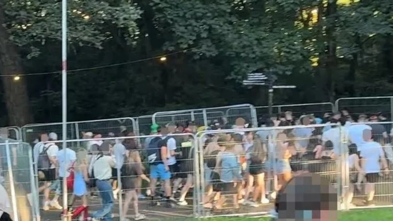 Oasis gig thrown into chaos after ticketless fans storm Heaton Park fences as band takes to stage