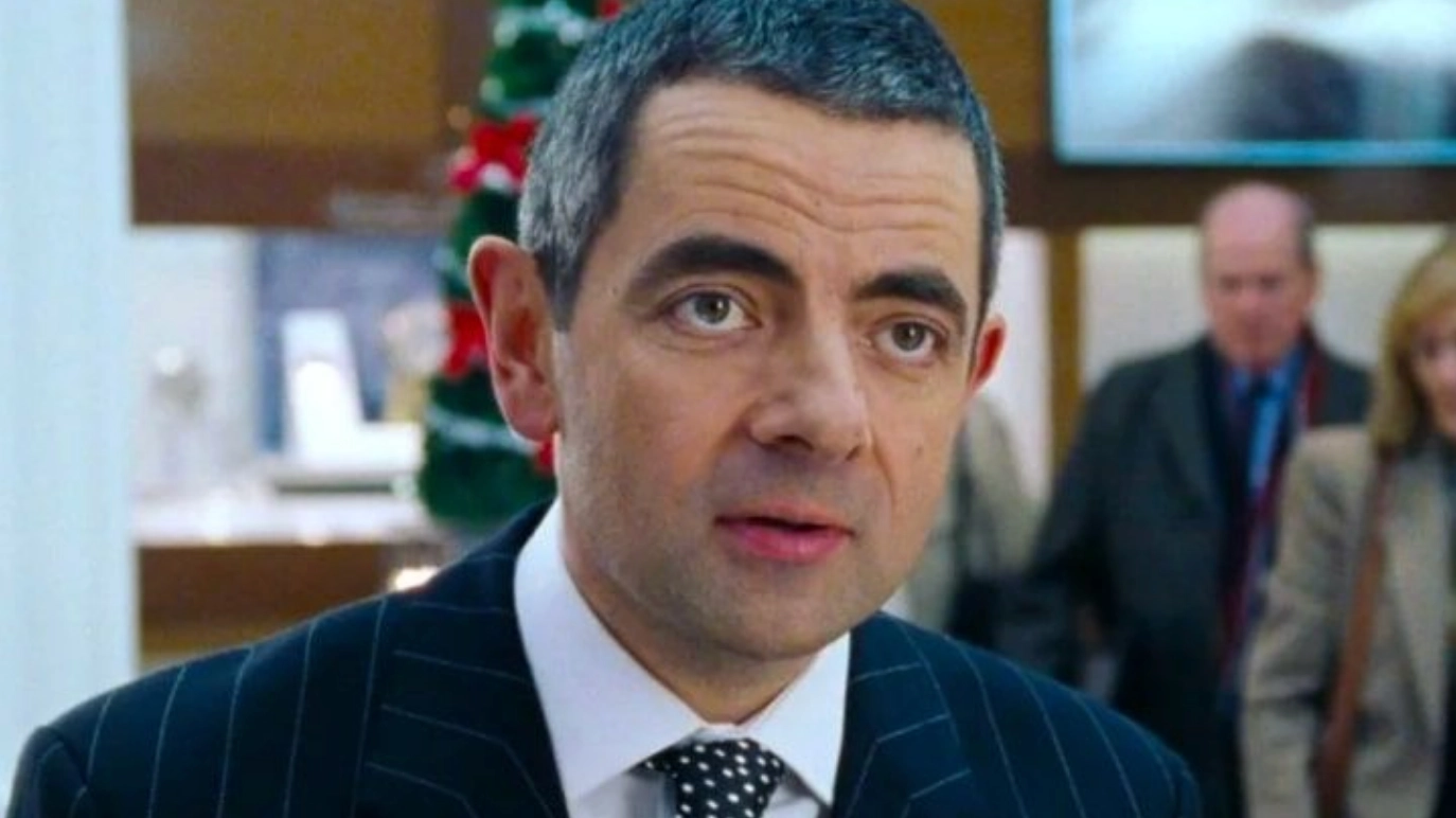 Real reason Rowan Atkinson appears twice in Love Actually as he confirms wild fan theory