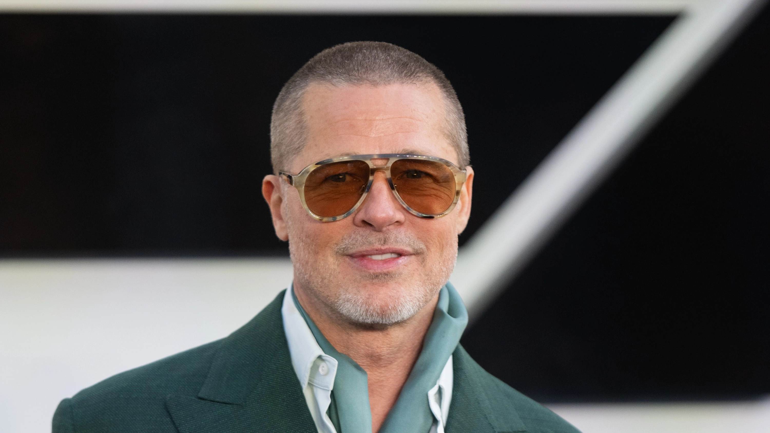 Brad Pitt once bid £90,000 to spend the evening with Emilia Clarke