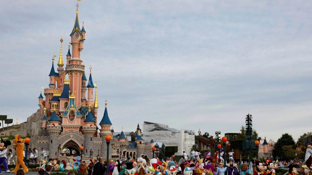 British man, 22, arrested at Disneyland for 'hiring out park to marry Ukrainian girl, 9' 