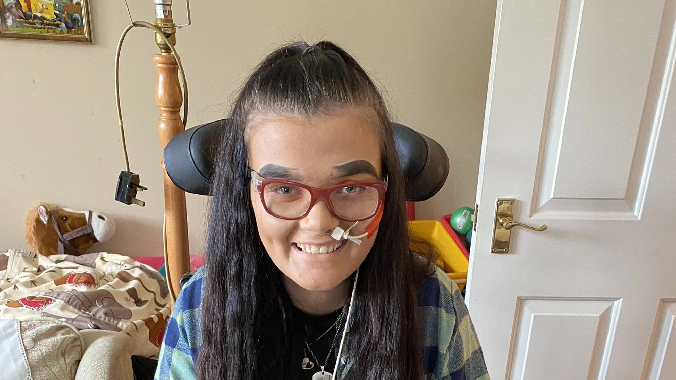 Woman woke up paralysed after doctors told her to 'stop being dramatic' over 'stomach bug'