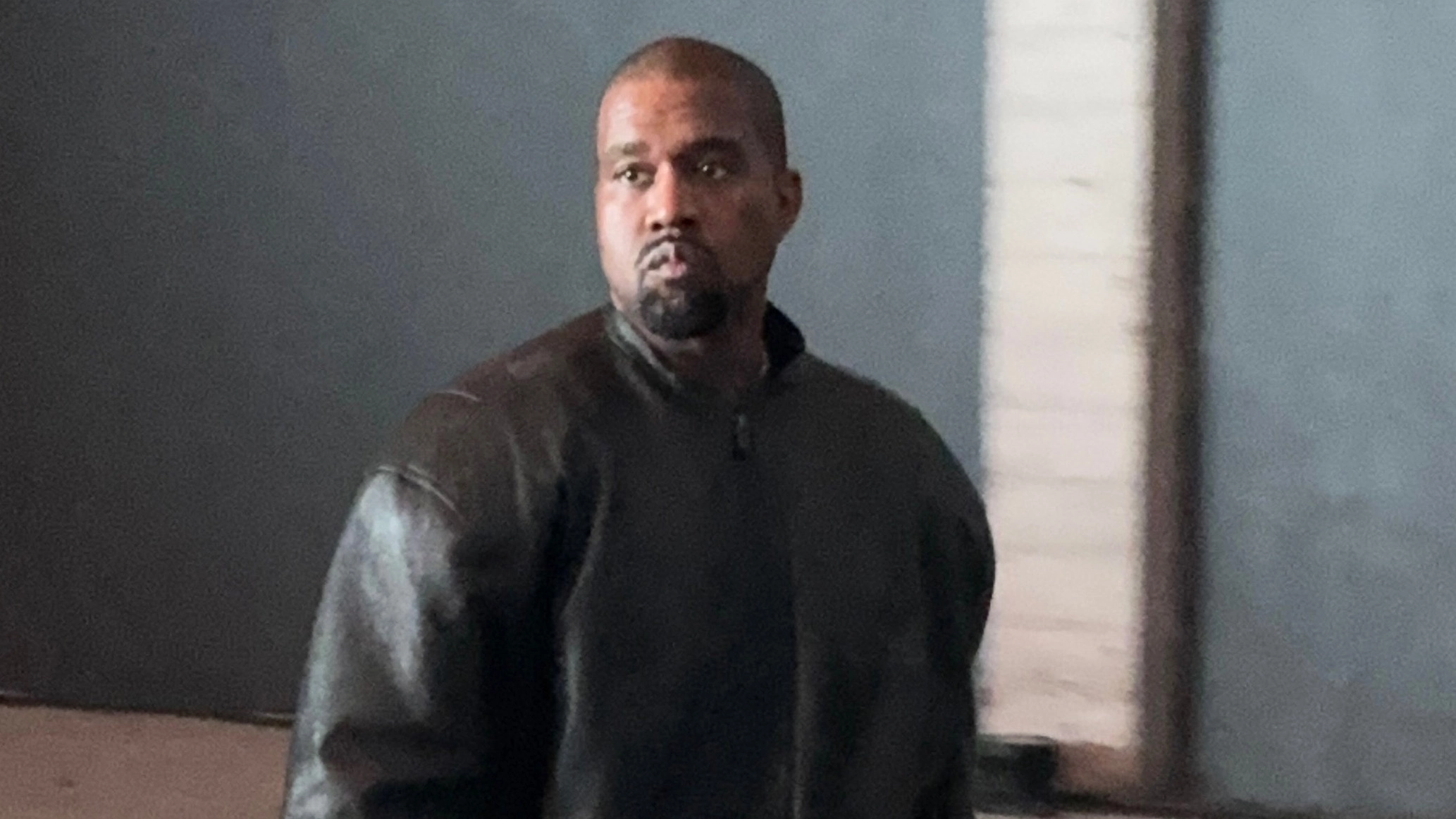 Kanye West sparks outrage after sharing ‘outfit of the day’ KKK-style clothing on his Instagram