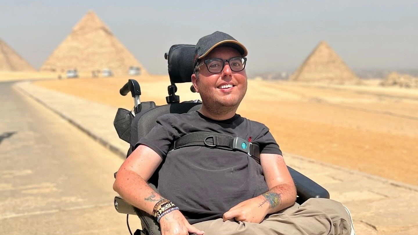 Man with SMA visits 55 countries across all seven continents after being rejected for job because it required travel