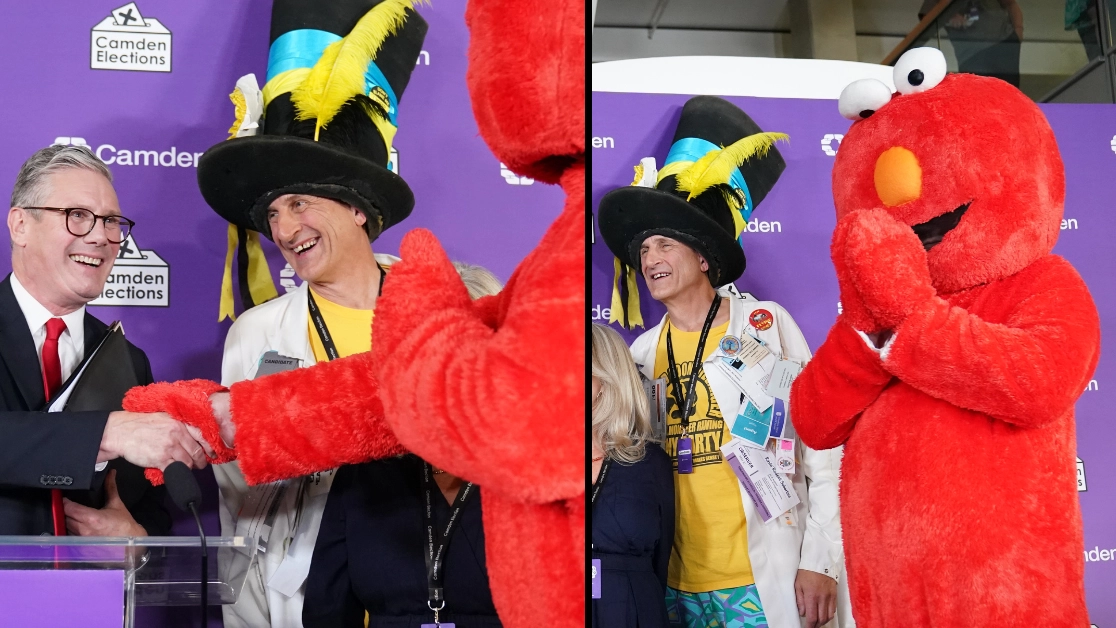 Brits can’t cope as Keir Starmer forced to shake hands with Elmo after winning landslide general election