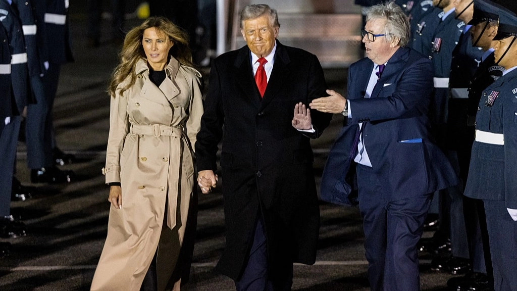 Melania Trump conspiracy theory reignited after unusual act when she touched down in UK with president