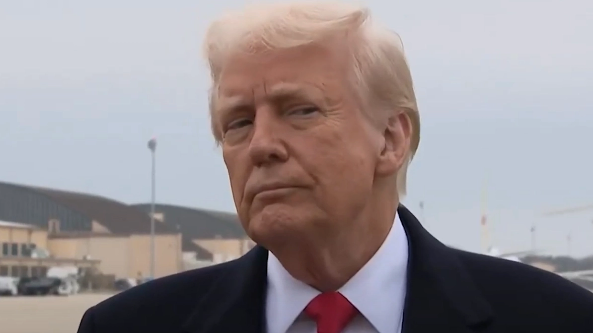 People left stunned as Donald Trump stares down reporter after being hit in the face with a boom mic