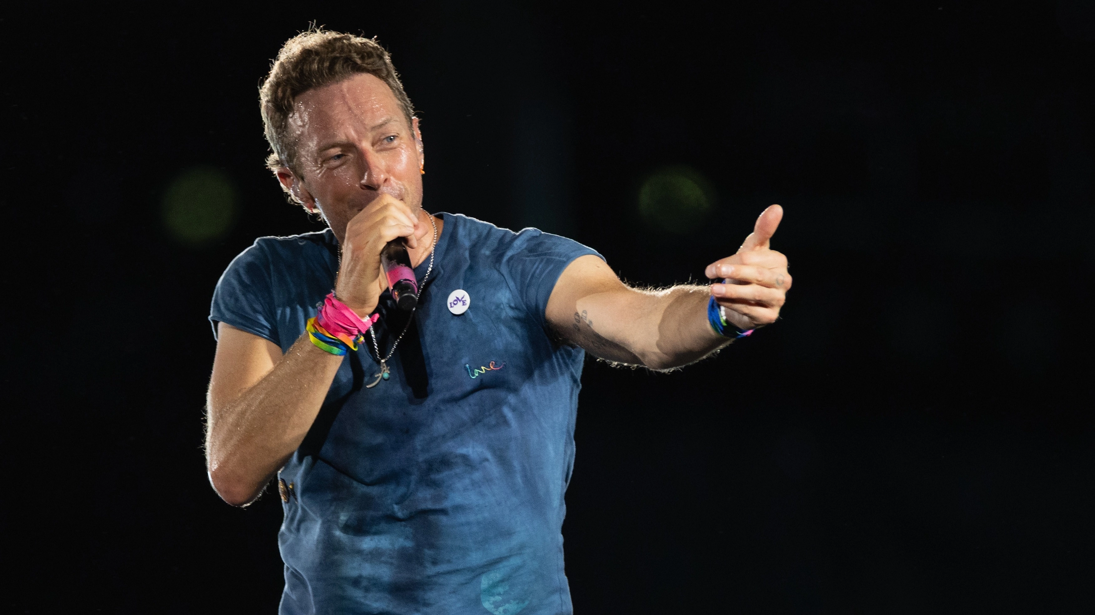 Chris Martin causes debate over comments to two Israeli fans he brought on stage at Wembley