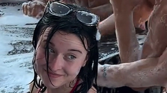 'Red bikini woman' speaks out after sparking backlash with latest stunt