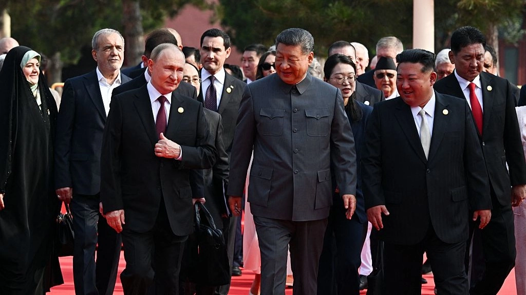 Putin, Xi and Kim Jong-un unite side-by-side to send chilling warning to the West