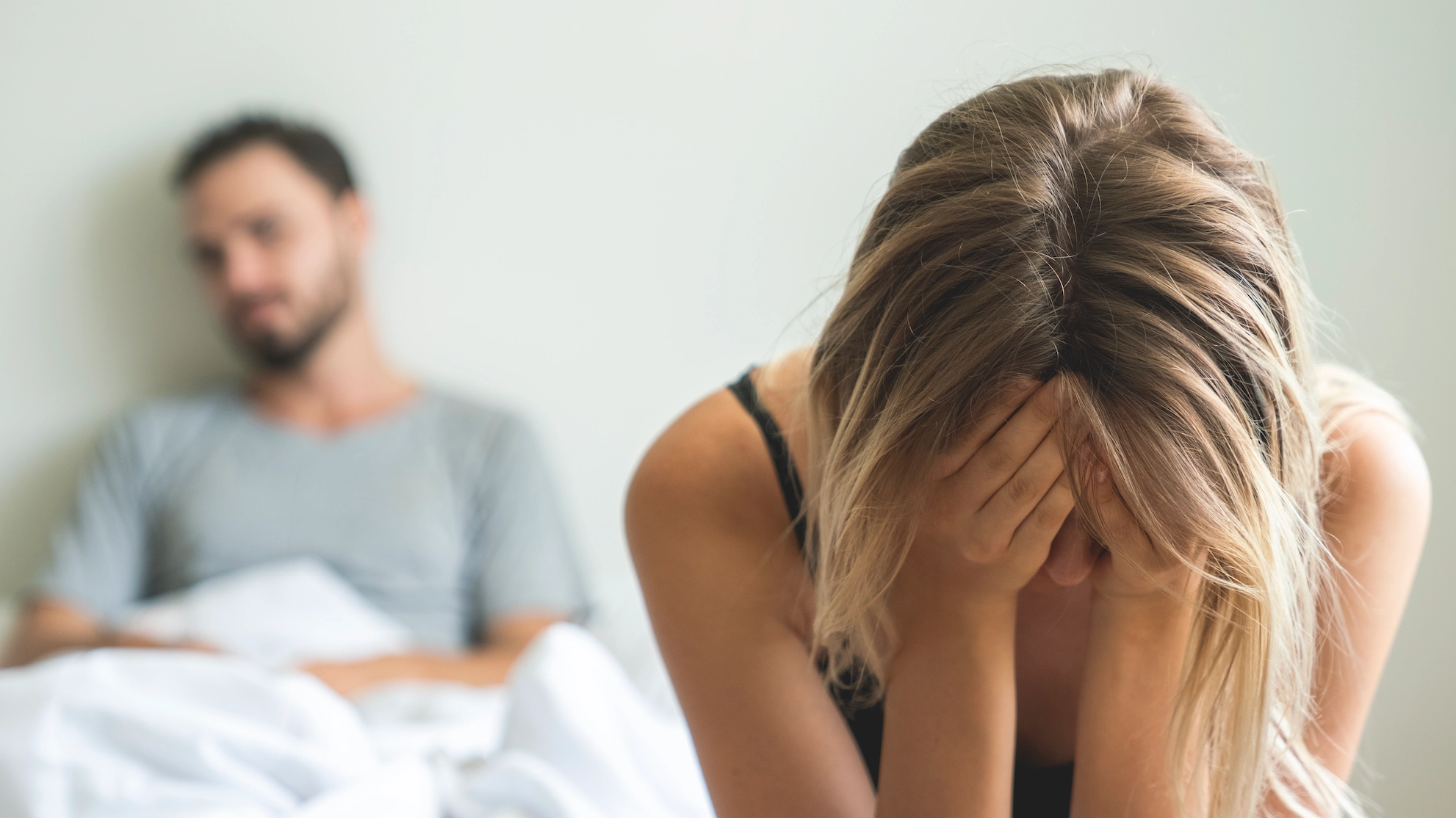 Body language expert explains key signs that a man may be cheating on you