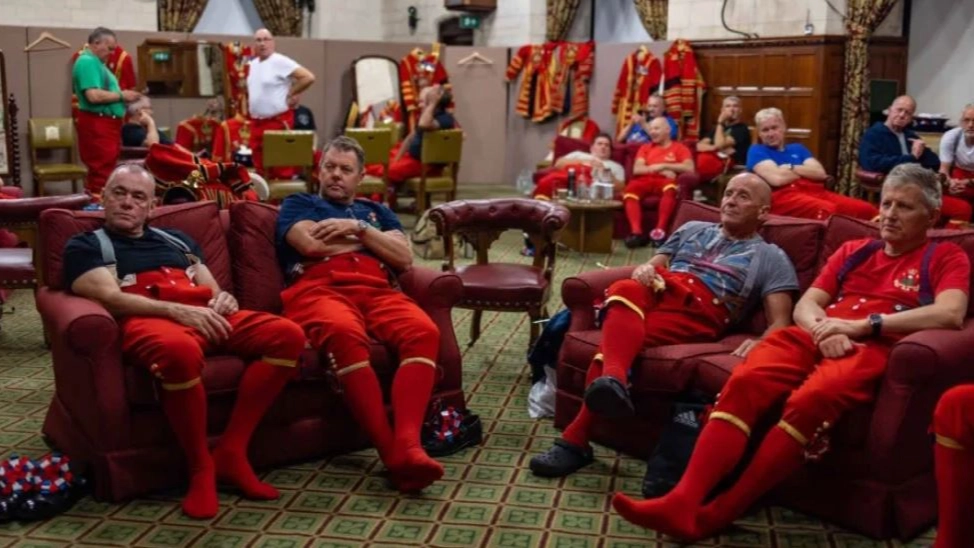 Exhausted beefeaters pictured taking a break from guarding Queen’s coffin