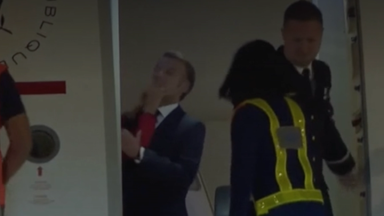 Emmanuel Macron speaks out after footage showed wife 'pushing him in face'