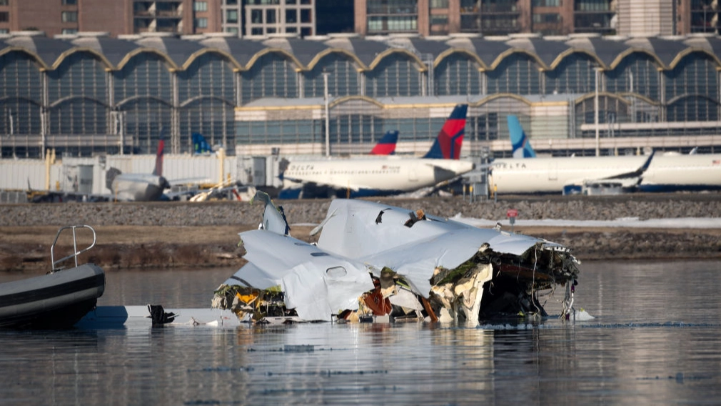 Plane was forced to re-direct in near-miss with helicopter at same airport one day before American Airlines crash