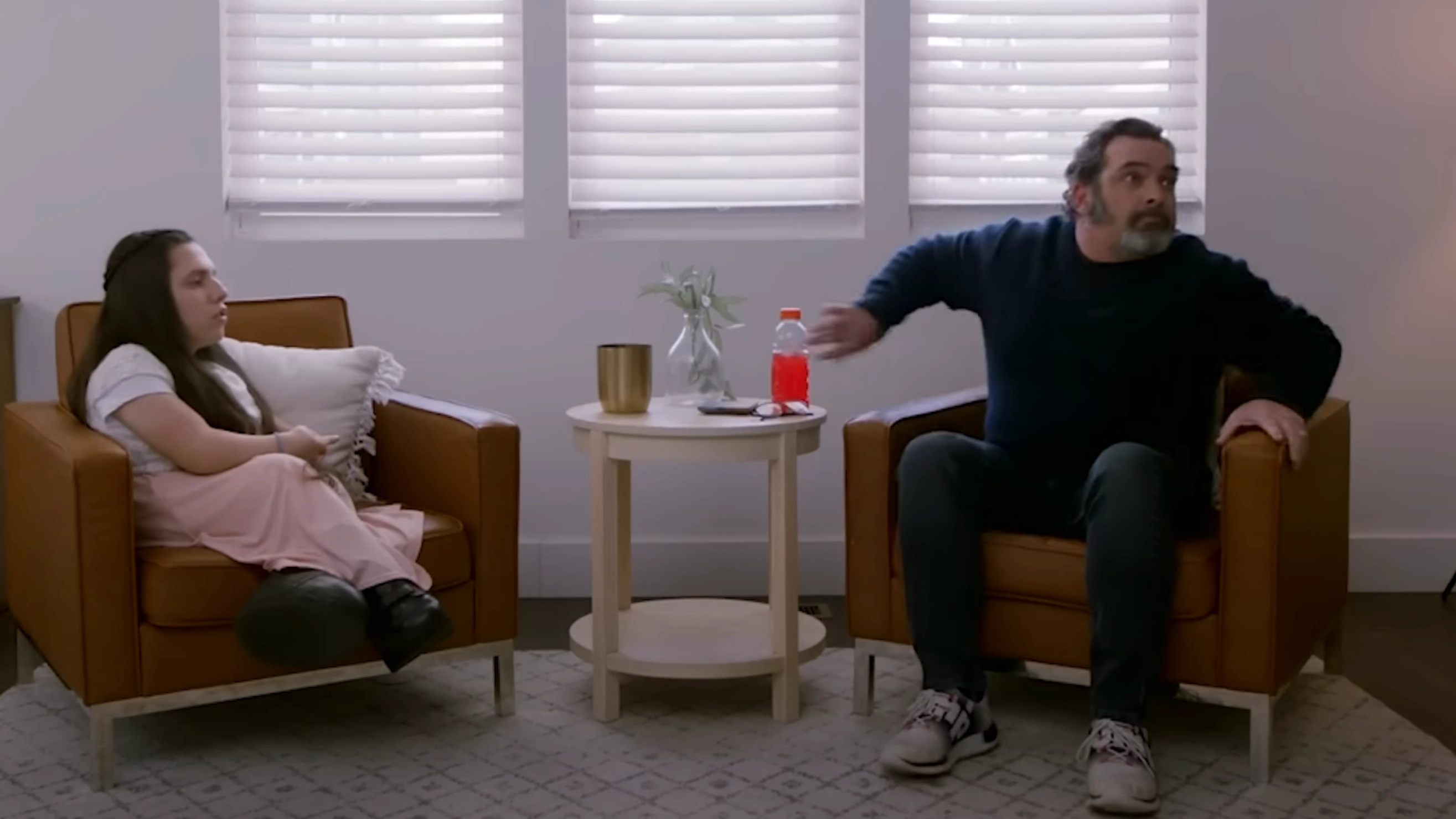 Father broke down with rage when reunited with adopted 'child' accused of being an adult