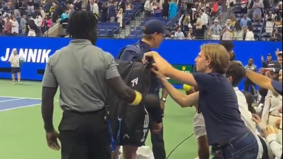 Shocking moment fan tries to get into world no1's bag while he's not looking at US Open