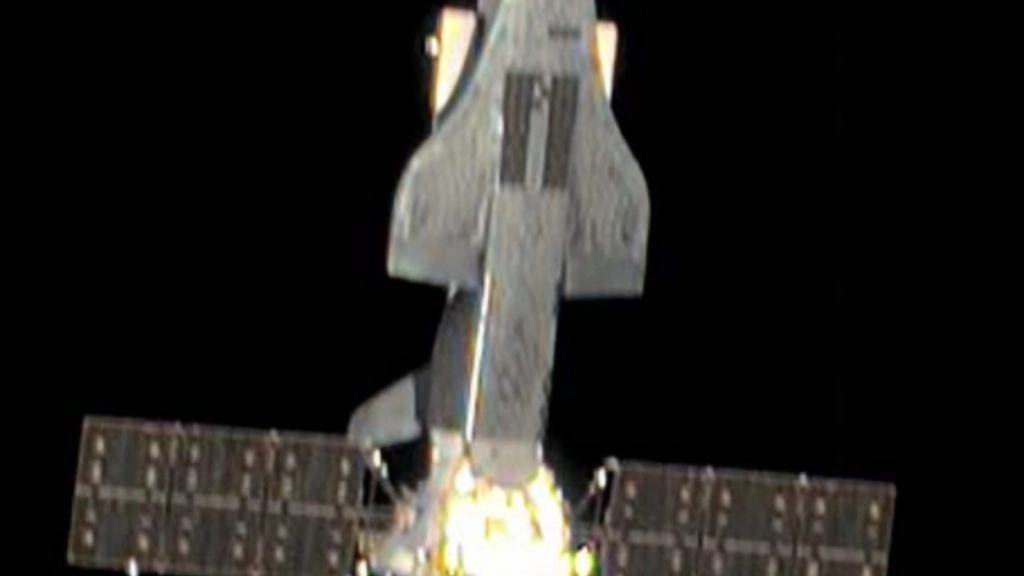 Top secret Chinese plane caught 'releasing mysterious objects above earth'