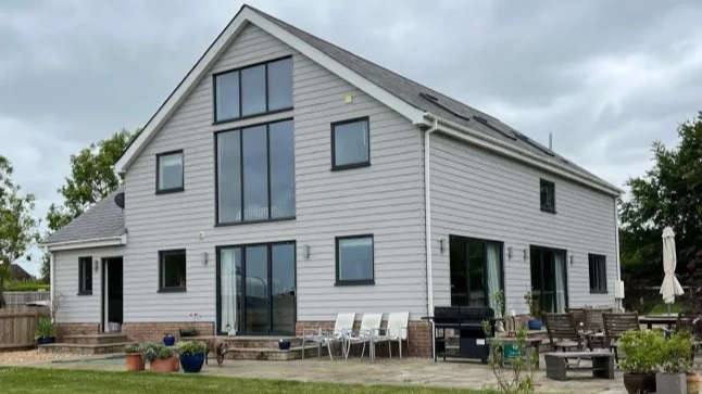 Couple ordered to tear down £1,000,000 house they built after 'misunderstanding' the rules