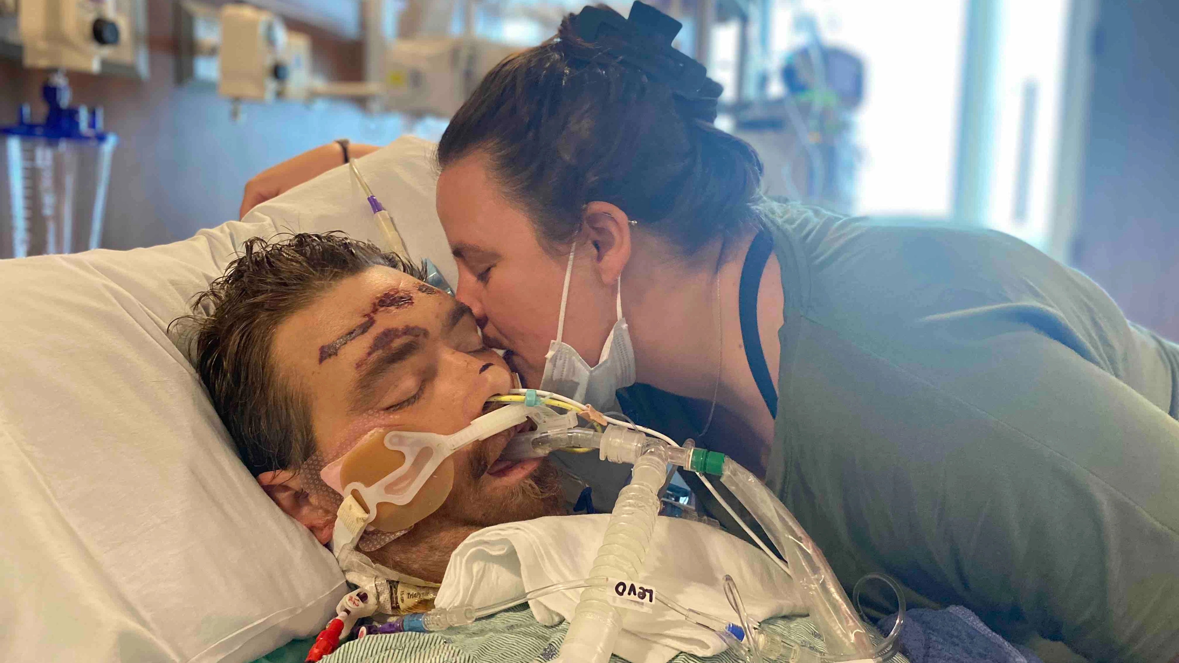 Heartwarming moment man who pulled out ingrown hair and was then given 4% chance of surviving wakes up from coma