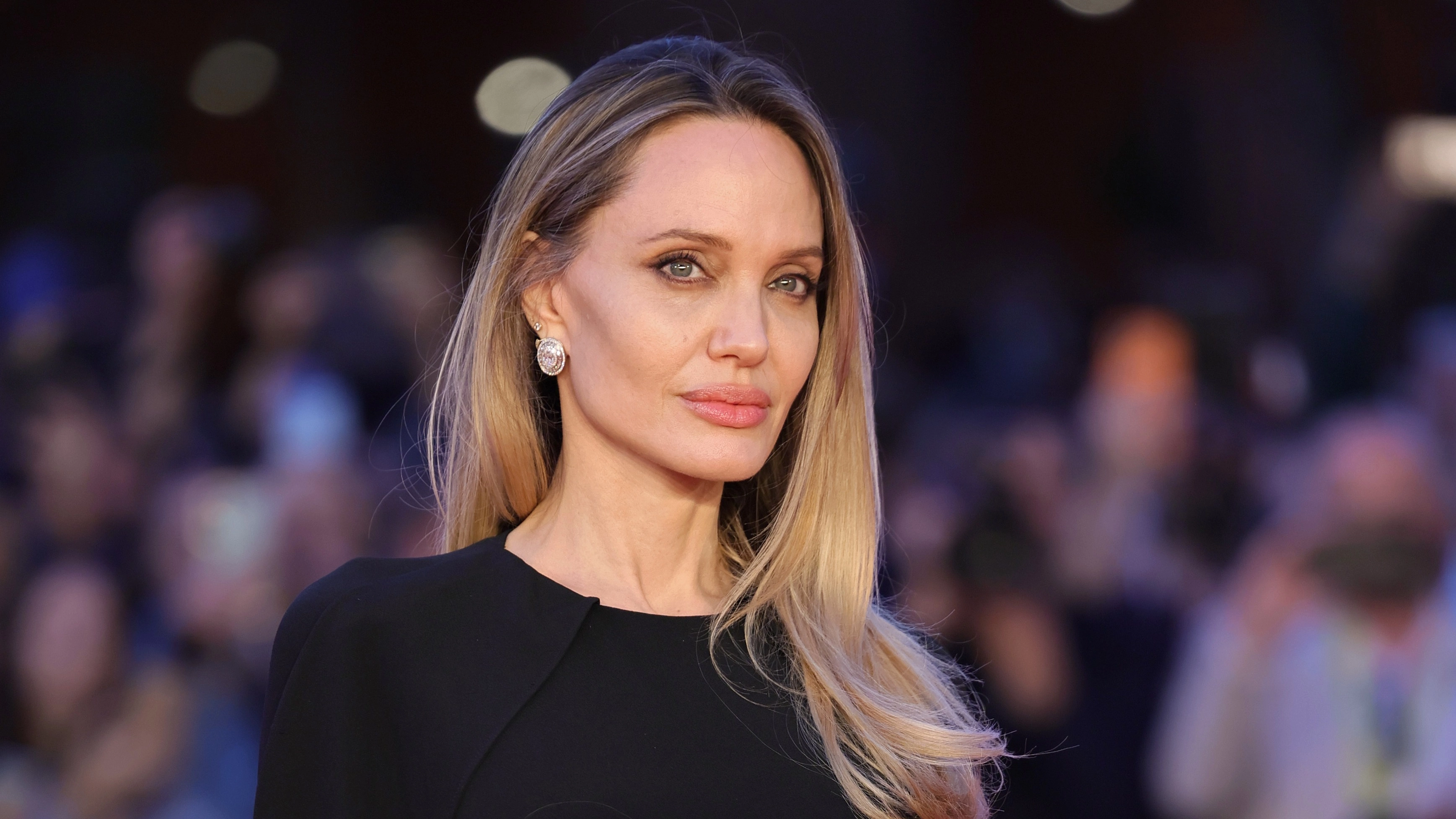 Angelina Jolie shows off double mastectomy scars for first time since 2013 surgery