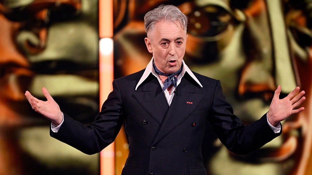 BAFTAs host Alan Cumming releases statement on 'sh*tshow' awards after racial slur