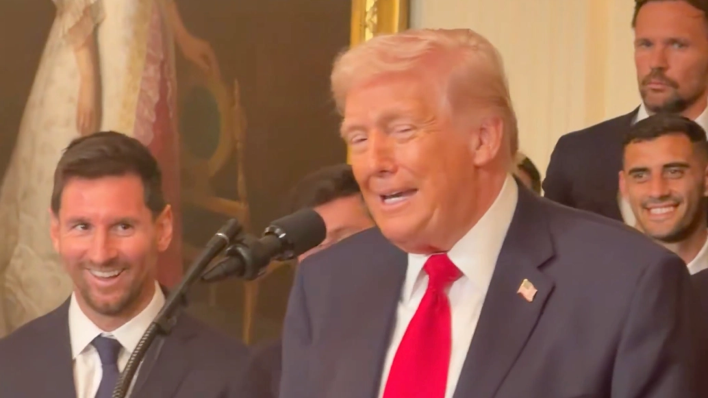 Lionel Messi's reaction when Donald Trump mentions Cristiano Ronaldo in White House speech
