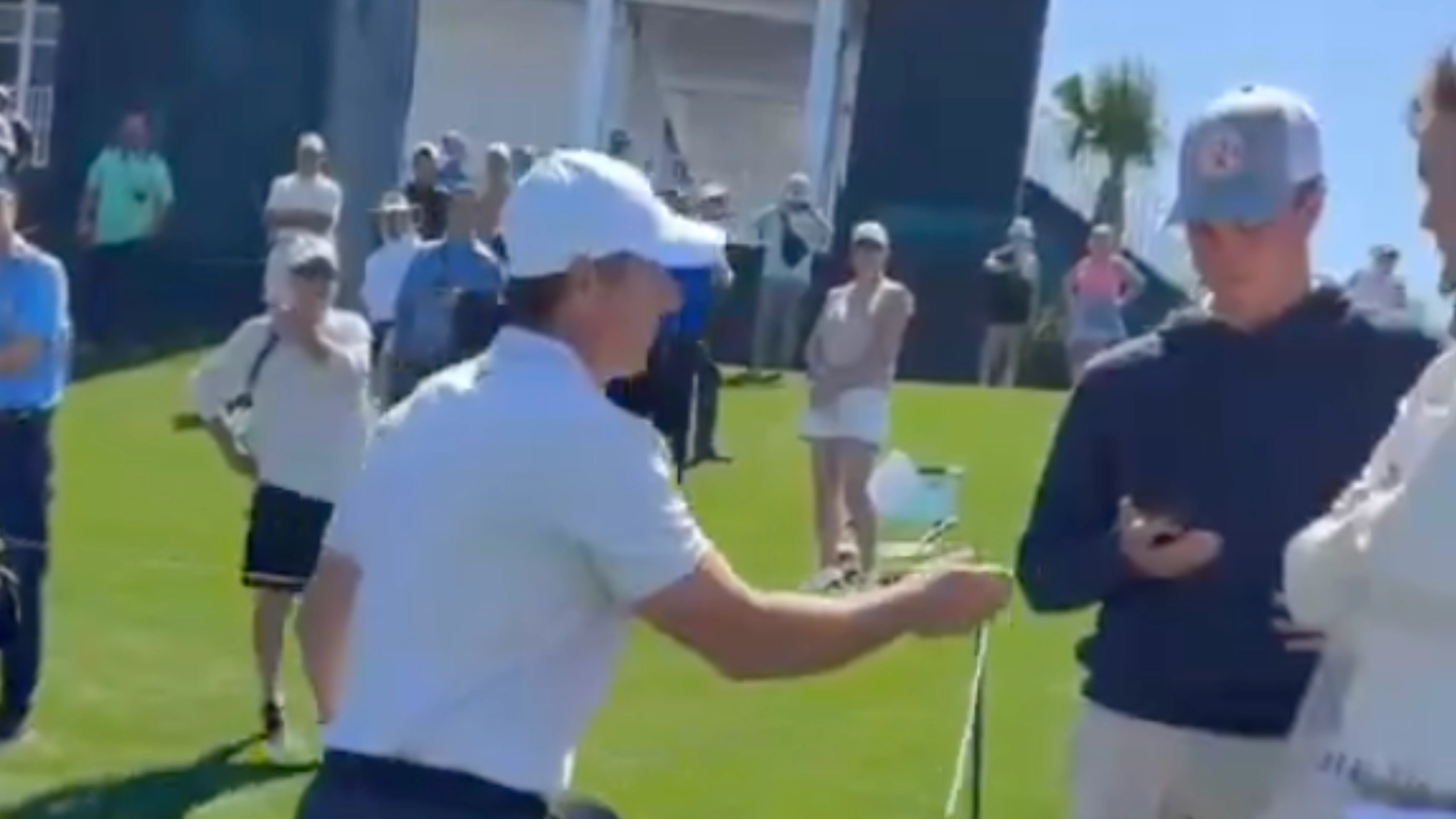 Rory McIlroy snaps at fan and snatches his phone as eyewitness reveals what was said to make golf star furious