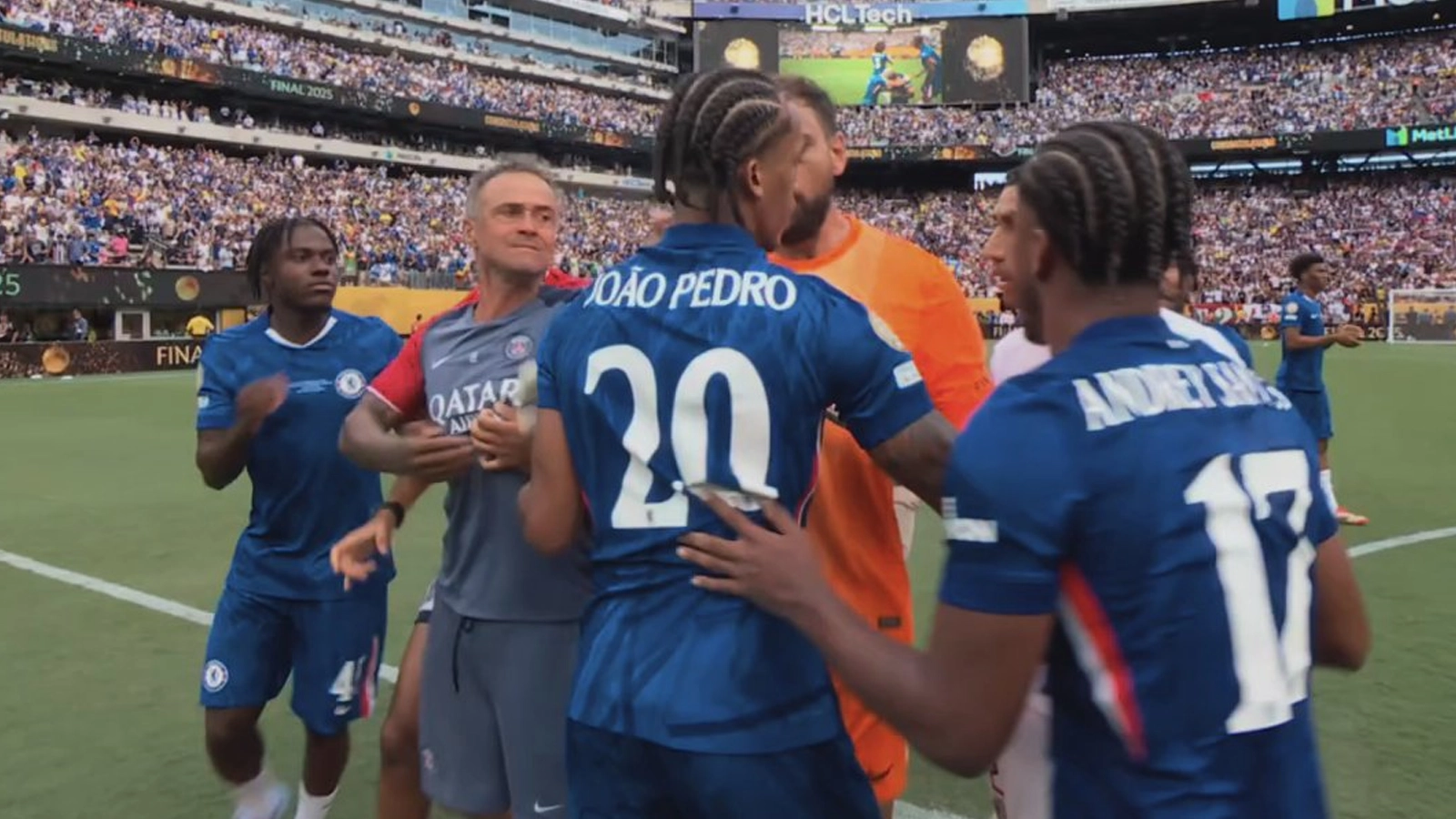 Luis Enrique appears to grab Joao Pedro by the throat as Chelsea 3-0 PSG post-match melee turns ugly