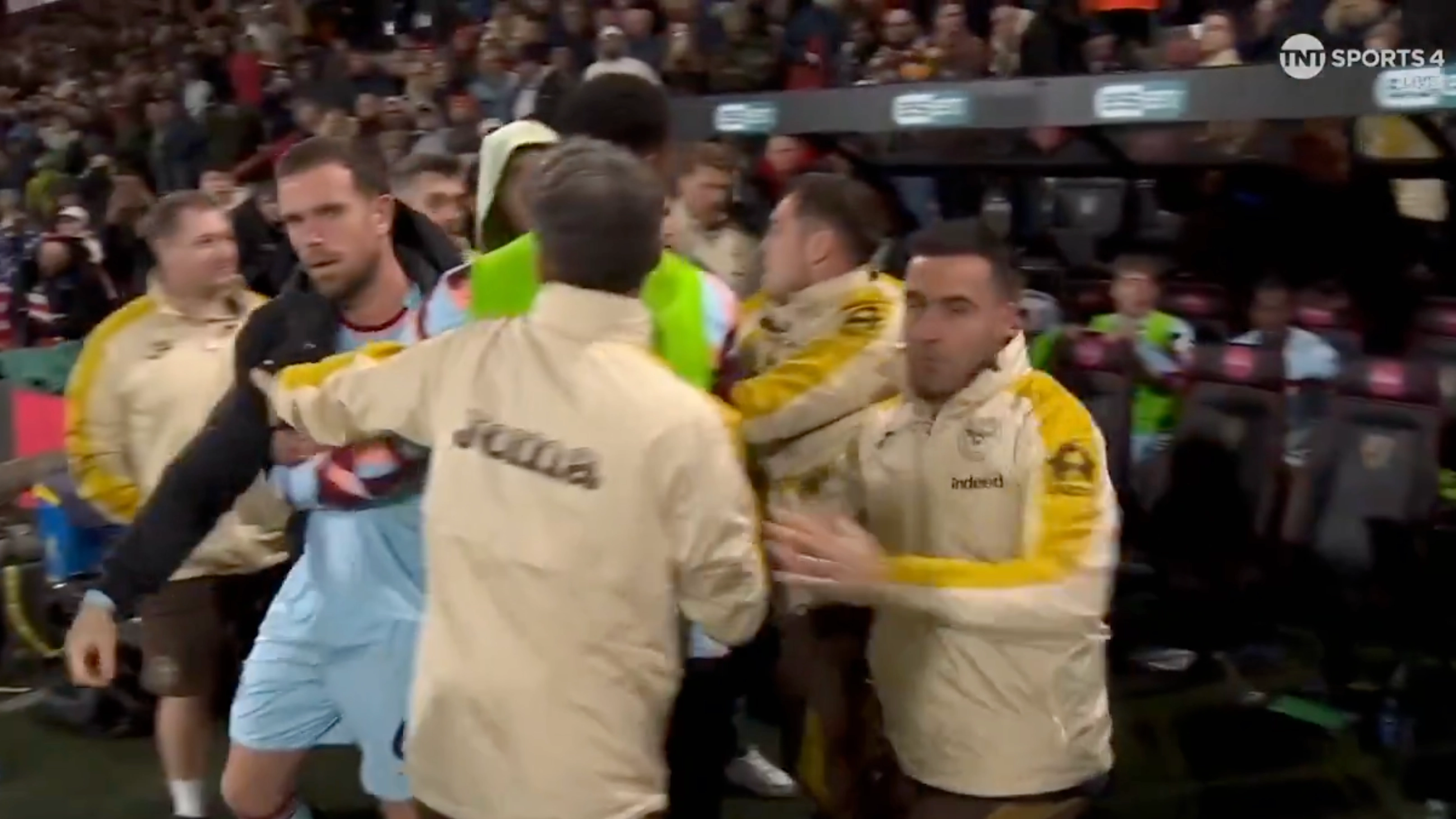 Jordan Henderson completely loses it on Brentford bench and is restrained by teammates