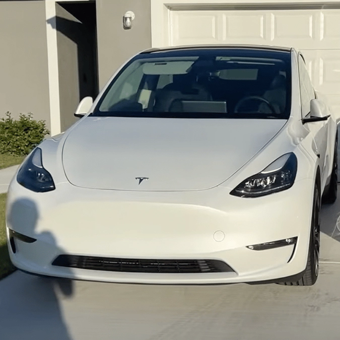 Couple shocked after comparing the energy bills of two Teslas they each drove 500 miles a week in