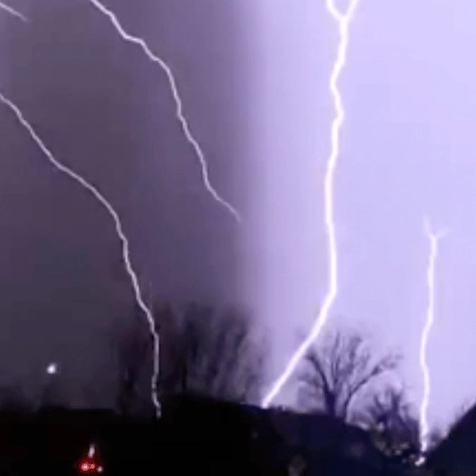 Slow motion footage of 'most insane strike of lightning' caught on camera leaves viewers in disbelief