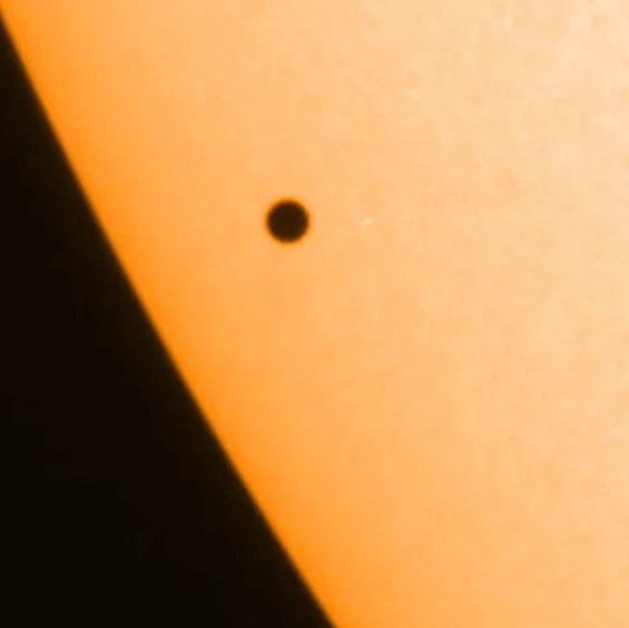 Mind-bending photo of Mercury in front of the Sun shows just how small the planet is in comparison