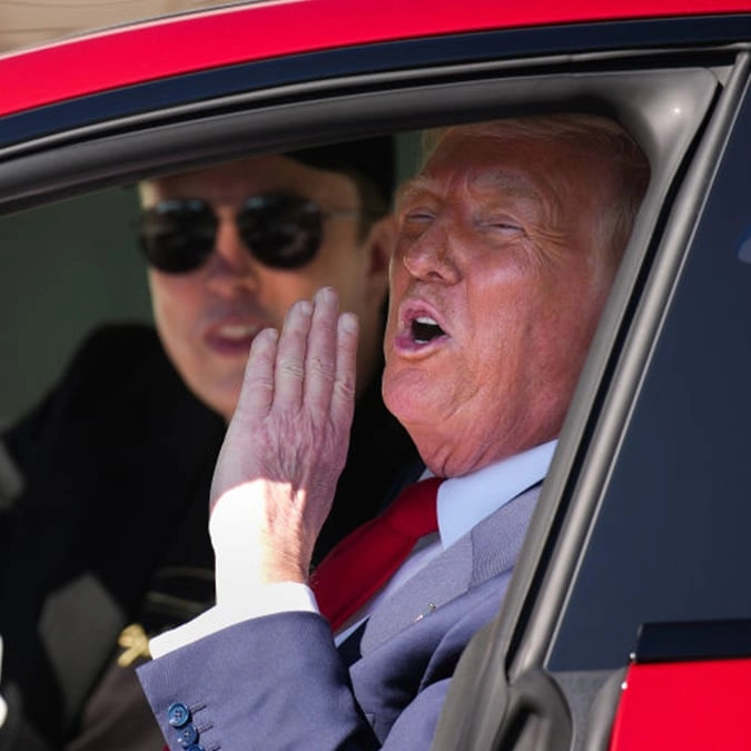 Trump's 3-word response to getting into a Tesla is sending the internet into a frenzy