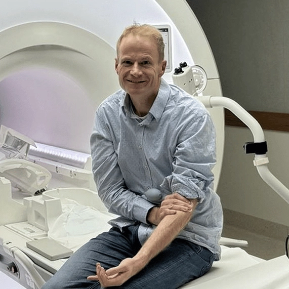 Doctor remains brain cancer-free a year on from his own pioneering treatment