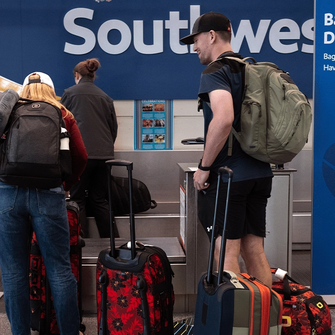 Airline reveals how much it will cost to check a bag as it officially ends iconic 'bags fly free' policy