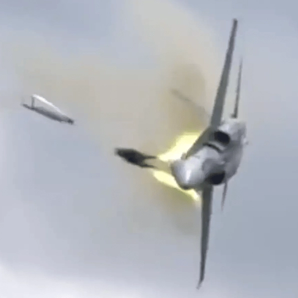 Terrifying footage shows fighter jet pilot ejecting two seconds before plane goes up in flames in near miss