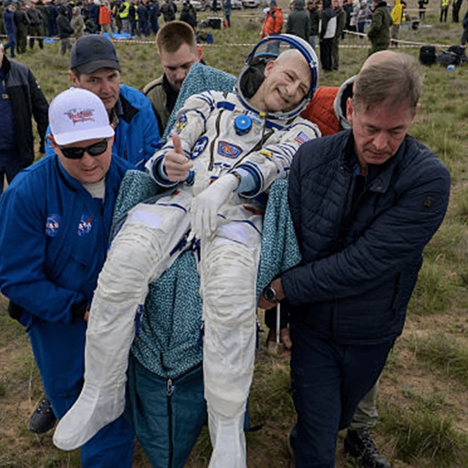 70-year-old NASA astronaut sends heartwarming signal moments before he's rushed to medical tent after returning from ISS