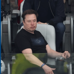 People in disbelief after boycott Tesla ads air during the Super Bowl with Elon Musk in the crowd