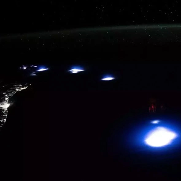 Mysterious red lights glowing in Earth's atmosphere spotted by astronauts