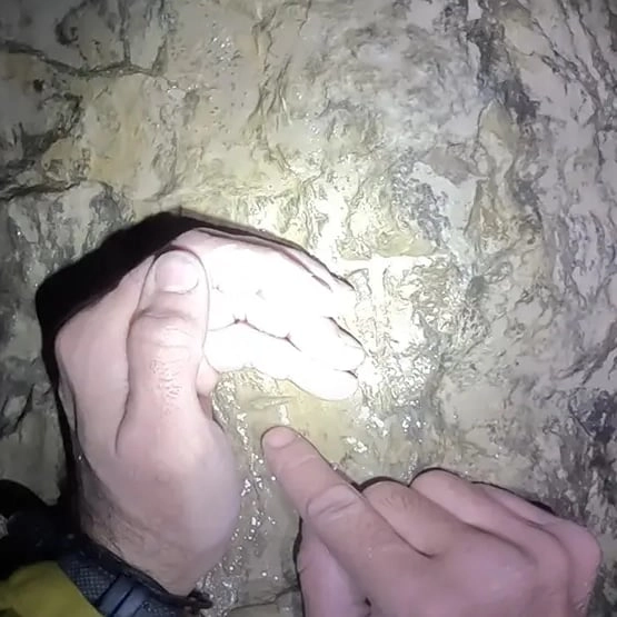 YouTuber uncovers 'never seen before' discovery on journey to center of the Earth inside 5,000,000 year old cave