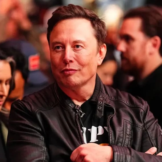 How much Elon Musk reportedly pays his employees at Tesla as the richest man in the world
