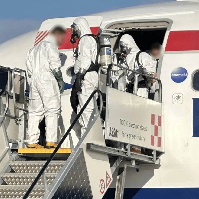 'Flight from Hell' grounded by mystery illness as hazmat team is forced to enter
