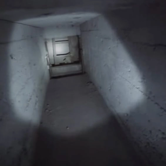 'Disturbing' video shows man discovering fully stocked underground safe house that looks lived in
