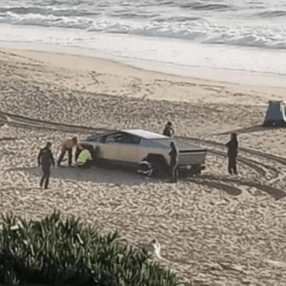 Cybertruck stuck on a beach has everyone saying the same thing