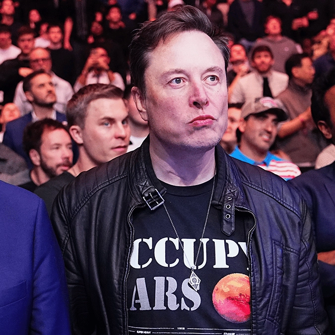 Disturbing NSFW AI video of Elon Musk and Donald Trump projected onto screens in government offices