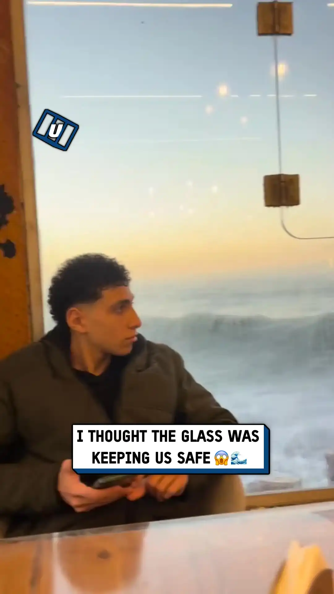 Giant wave breaks window 😱🌊