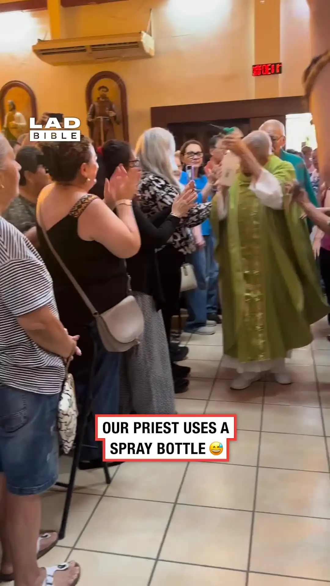 Priest uses spray bottle full of holy water 👏💦