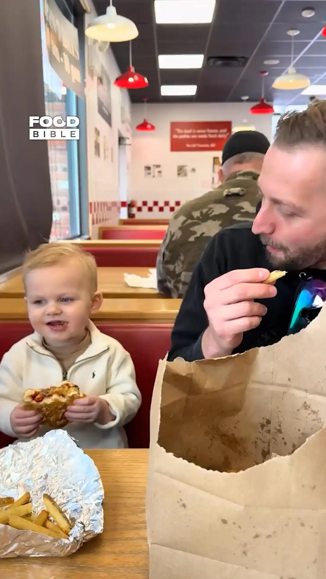 Kid enjoys burger 🍔